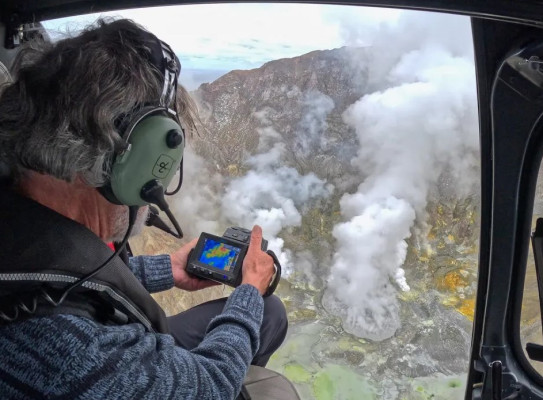 Brad with Thermal IR camera over Whakaari