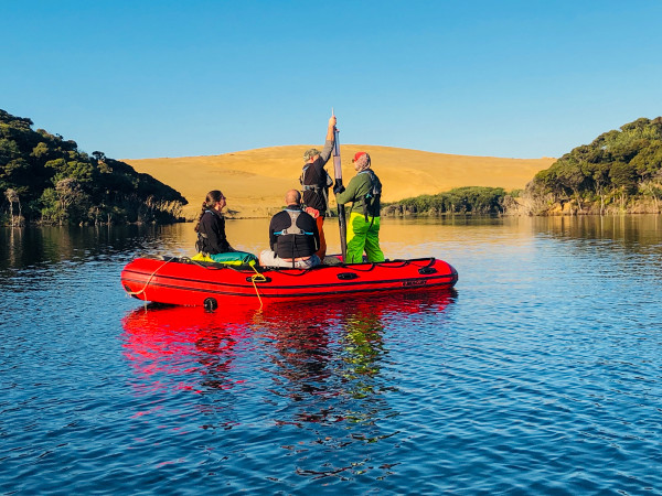 Taking a sediment core from Lake Wai Roupu in Northland photo credit Lakes380 team 3